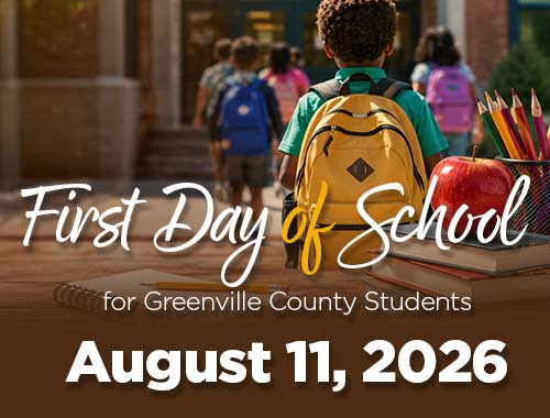 an image of students walking in to school to announce the firist day of school foir greenville county on august 11th